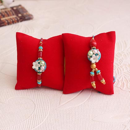 Send Colorful Bhaiya Bhabhi Rakhi With Kaju Roll Online Rakhibazaar Com