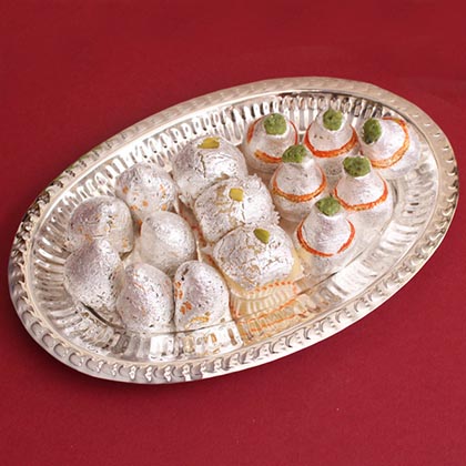 Silver Rakhis with Flavorful Sweets