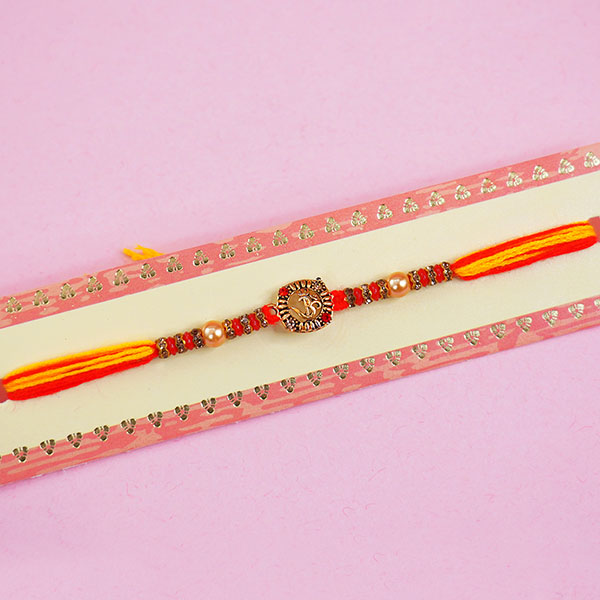 Attractive Golden Rakhi with Ferrero Rochers