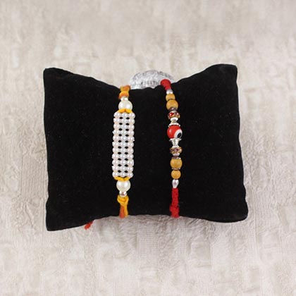 Two Pearl Rakhis with Chocolates