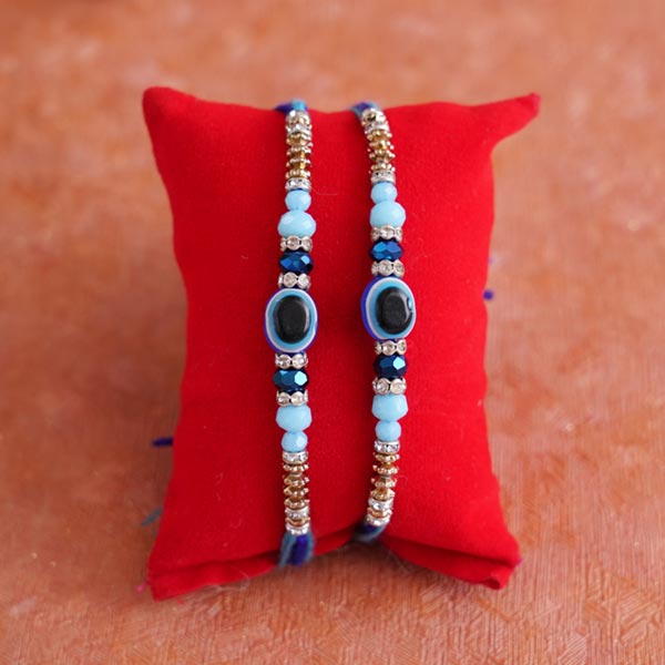 Evil Eye Rakhi Set with Kaju Roll