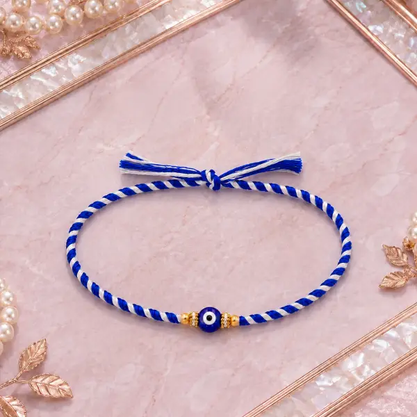Dual Blue Evil Eye Rakhi with Roli Chawal