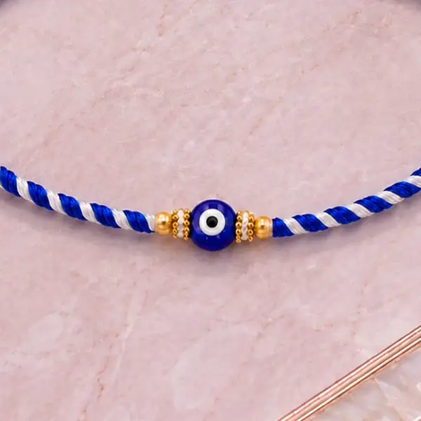 Dual Blue Evil Eye Rakhi with Roli Chawal