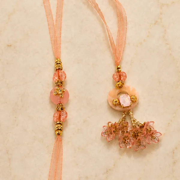 Elegant Peach Thread Bhaiya Bhabhi Lumba Rakhi Set