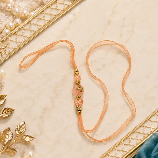 Elegant Peach Thread Bhaiya Bhabhi Lumba Rakhi Set