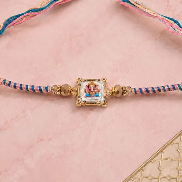 Shree Ganesha Pink Blue Thread Rakhi for Brother