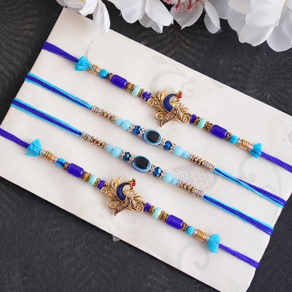 Set of 2 Ganesha Rakhi, 2 Peacock Rakhi and 4 Evil Eye Rakhi