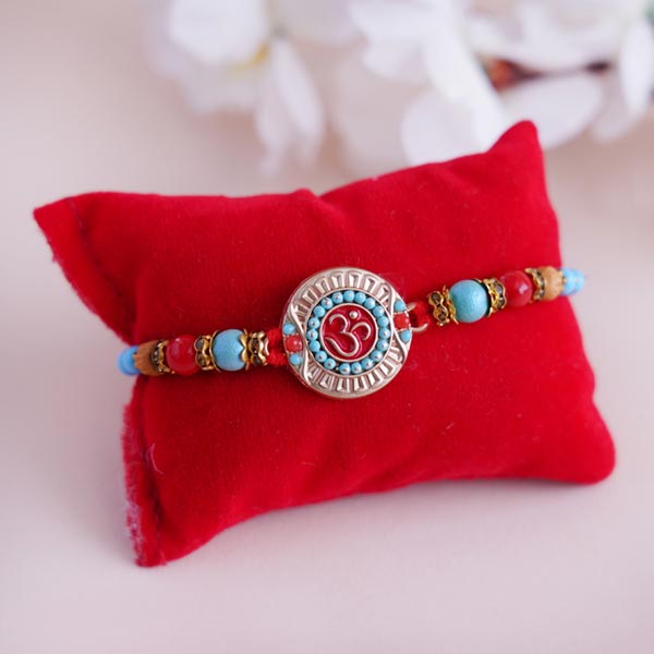 Om Rakhi Combo with Cashews Tray and Chocolates