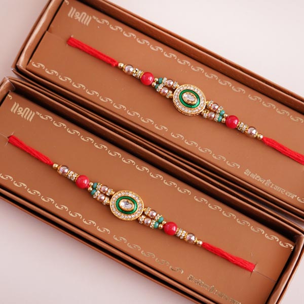 Two Designer Rakhis with Almonds and Chocolates