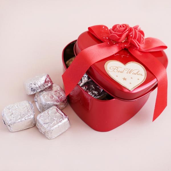 Two Designer Rakhis with Almonds and Chocolates
