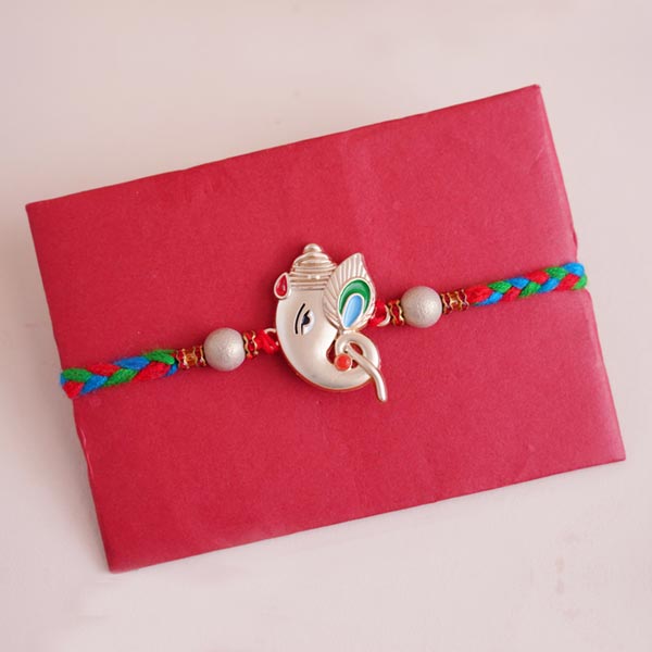 Ganesha Rakhi Rakhi Combo with Pista and Chocolates