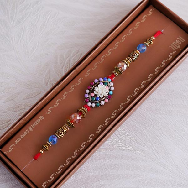 Rakhi with Pista and Designer Golden Tray