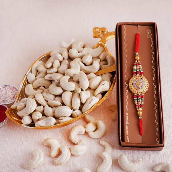 Golden Rakhi With Cashews and Golden Tray