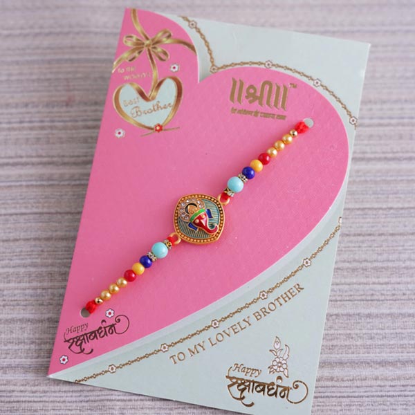 Designer Ganesha Rakhi with Cashew and Golden Bowl