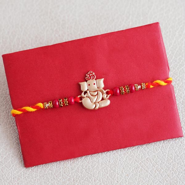 Silver Ganesha Rakhi with Besan Laddoo