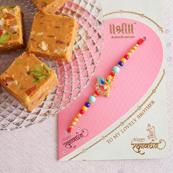 Peacock Rakhi with Besan Barfi Sweets