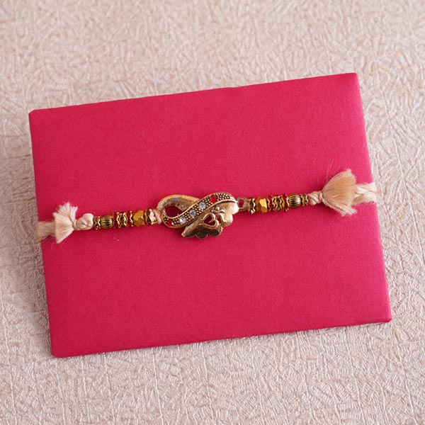 Designer Rakhi with Lucky Bamboo and Snicker Chocolate