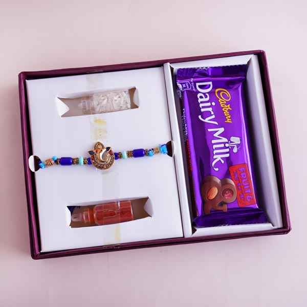 Ganesha Rakhi Signature Box with Snake Plant in Designer Pot