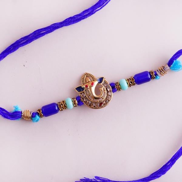 Ganesha Rakhi Signature Box with Snake Plant in Designer Pot