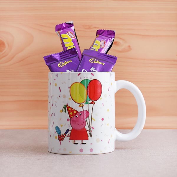 Two Foodie Rakhis with Chocolates and Mug