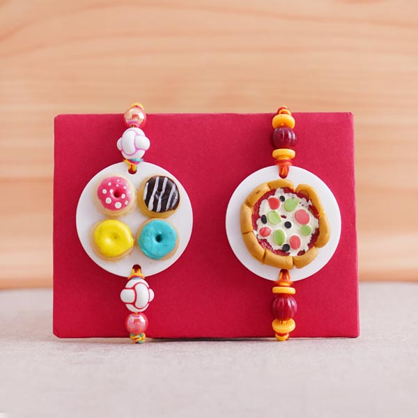 Two Foodie Rakhis with Chocolates and Mug