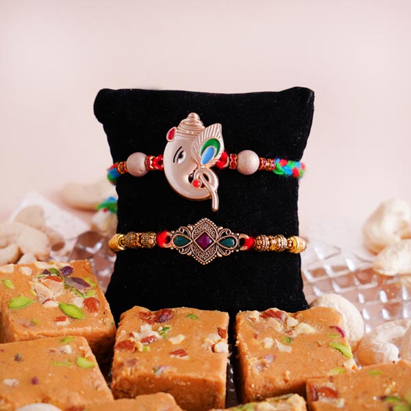 Two Designer Rakhi with Sweets Hamper