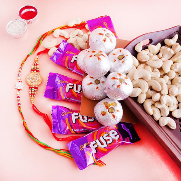 Two Fancy Rakhi Hamper with Sweets and Chocolates