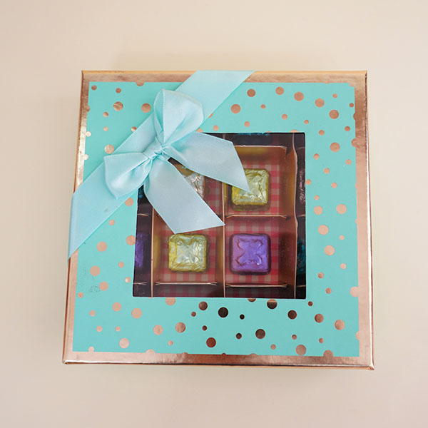 Golden Ganesha Rakhi with Assorted Chocolates