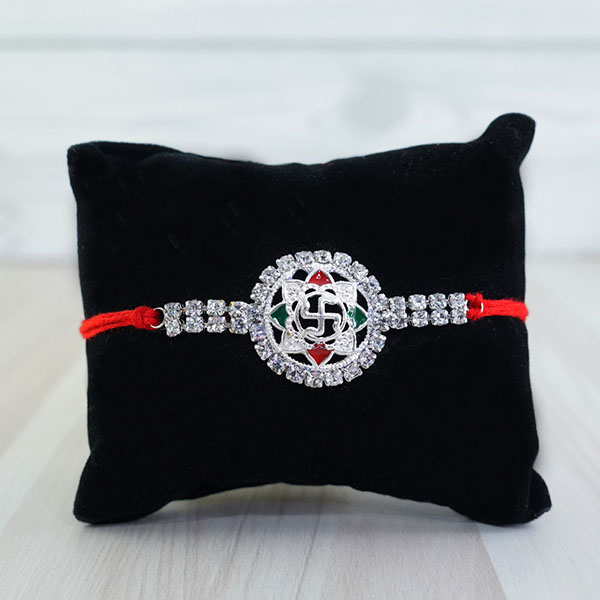 Designer Silver Rakhi with Peace Lily