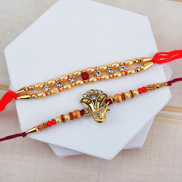 Set of Two Pearl Rakhis with Cushion N Chocolates