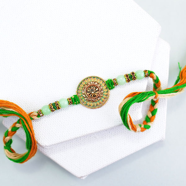 Designer Rakhi with Bottle N Snacks Gift Hamper