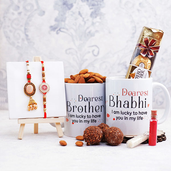 Dearest Brother Bhabhi Mugs N 2 Rakhi with Chocolates Gift Hamper