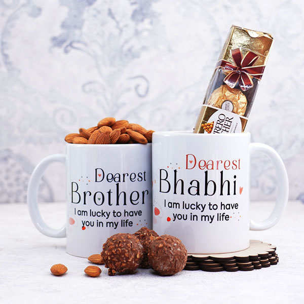 Dearest Brother Bhabhi Mugs N 2 Rakhi with Chocolates Gift Hamper