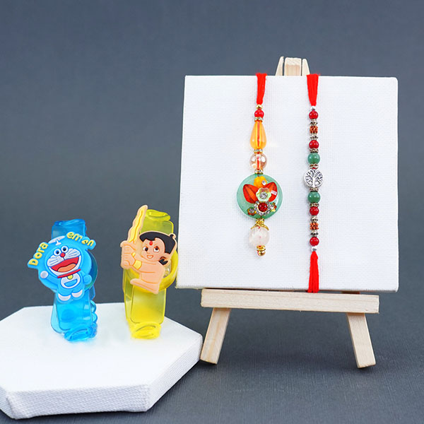 4 Rakhis with Bhaiya Bhabhi Mugs N Chocolates Gift Hamper