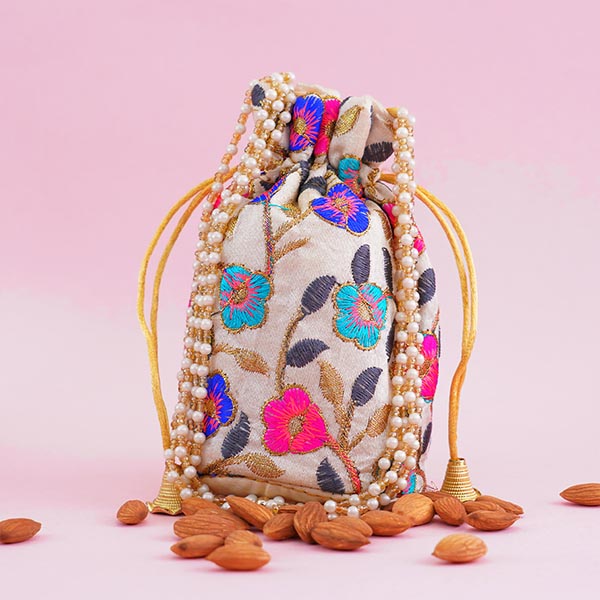 Designer Bhaiya Bhabhi Rakhi with Almonds in Potli