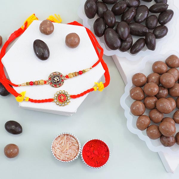 Pair of Golden Rakhis with Dry Fruit Chocolates
