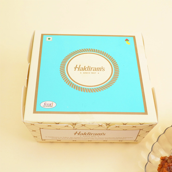 AD Om Rakhi with Haldirams Choco Bites