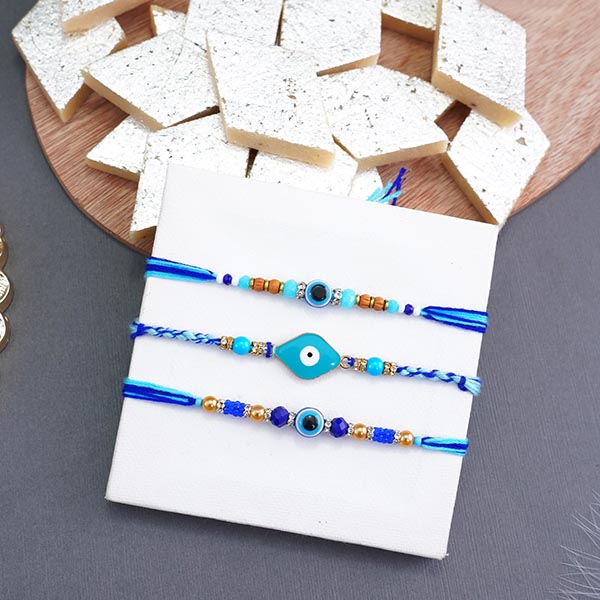 Triple Evil Eye Rakhi with Kaju Katli
