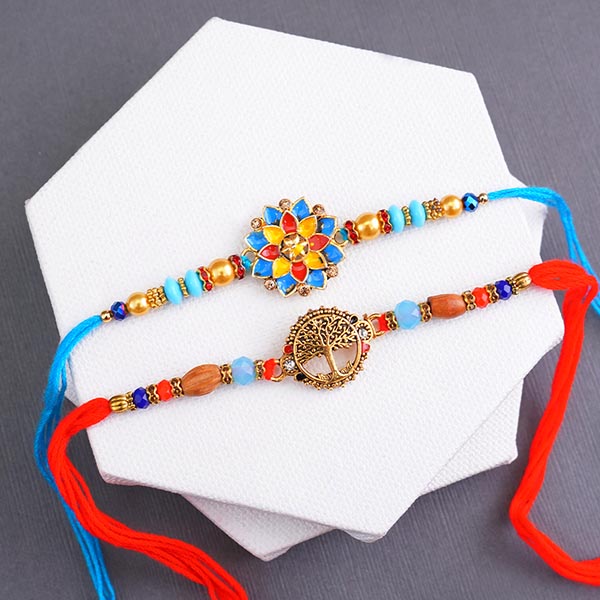 Golden Rakhi N Flower Rakhi with Sweets Combo