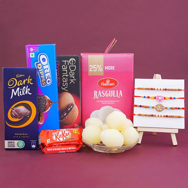 Set of Four Rakhis with Chocolates N Sweets Gift Pack