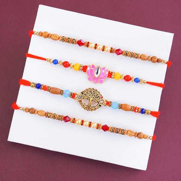 Set of Four Rakhis with Chocolates N Sweets Gift Pack