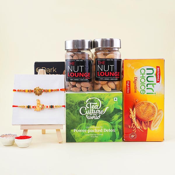 Ganesha Rakhi N Laddu Gopal Rakhi with Dry Fruits Gift Hamper