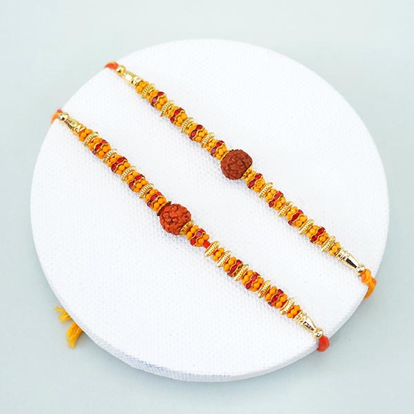 Three Auspicious Rakhis with Dry Fruits Gift Hamper