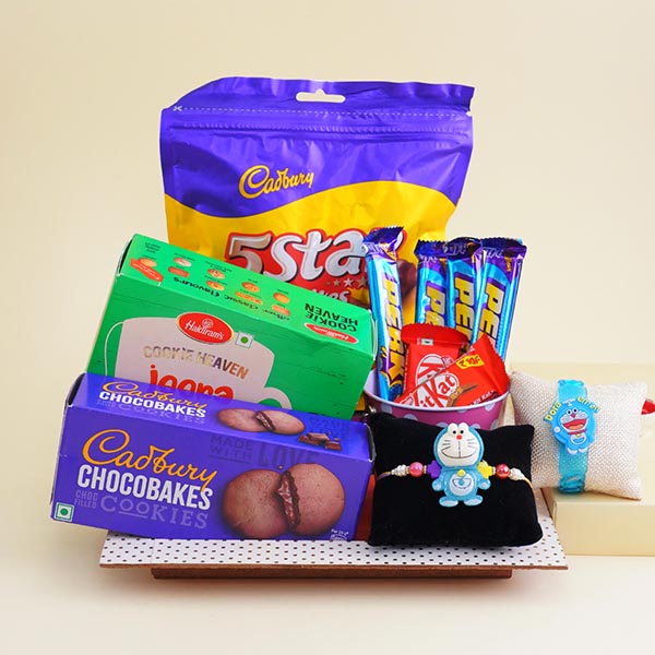 Two Doraemon Kids Rakhi with Chocolates N Cookies