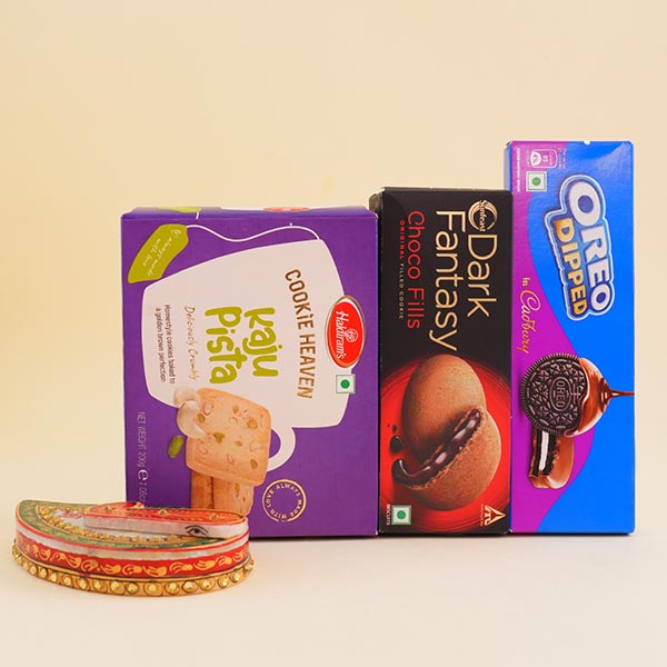 Three Golden Rakhis with Chocolates Gift Hamper