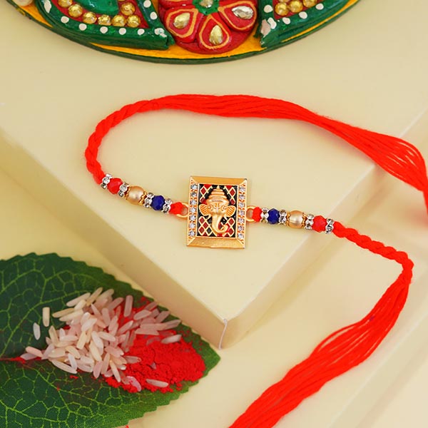 Stunning Golden Ganesha Rakhi