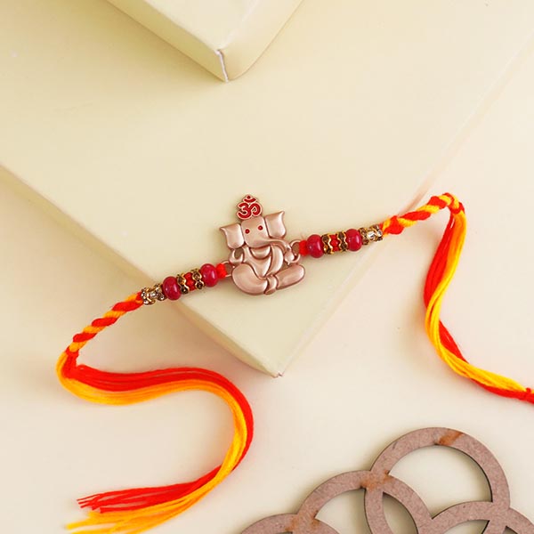 Golden Ganesha Rakhi N Beaded Rakhi Set