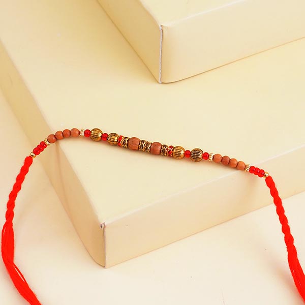 Golden Ganesha Rakhi N Beaded Rakhi Set