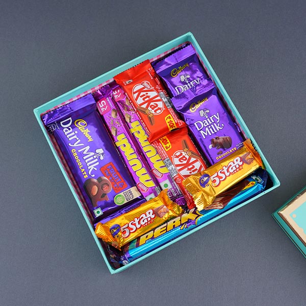 Silver Om Rakhi N Chocolates in a Designer Box