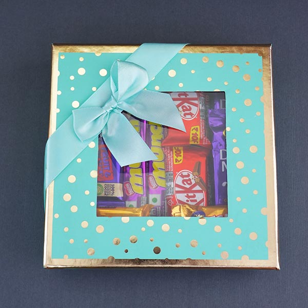 Silver Om Rakhi N Chocolates in a Designer Box